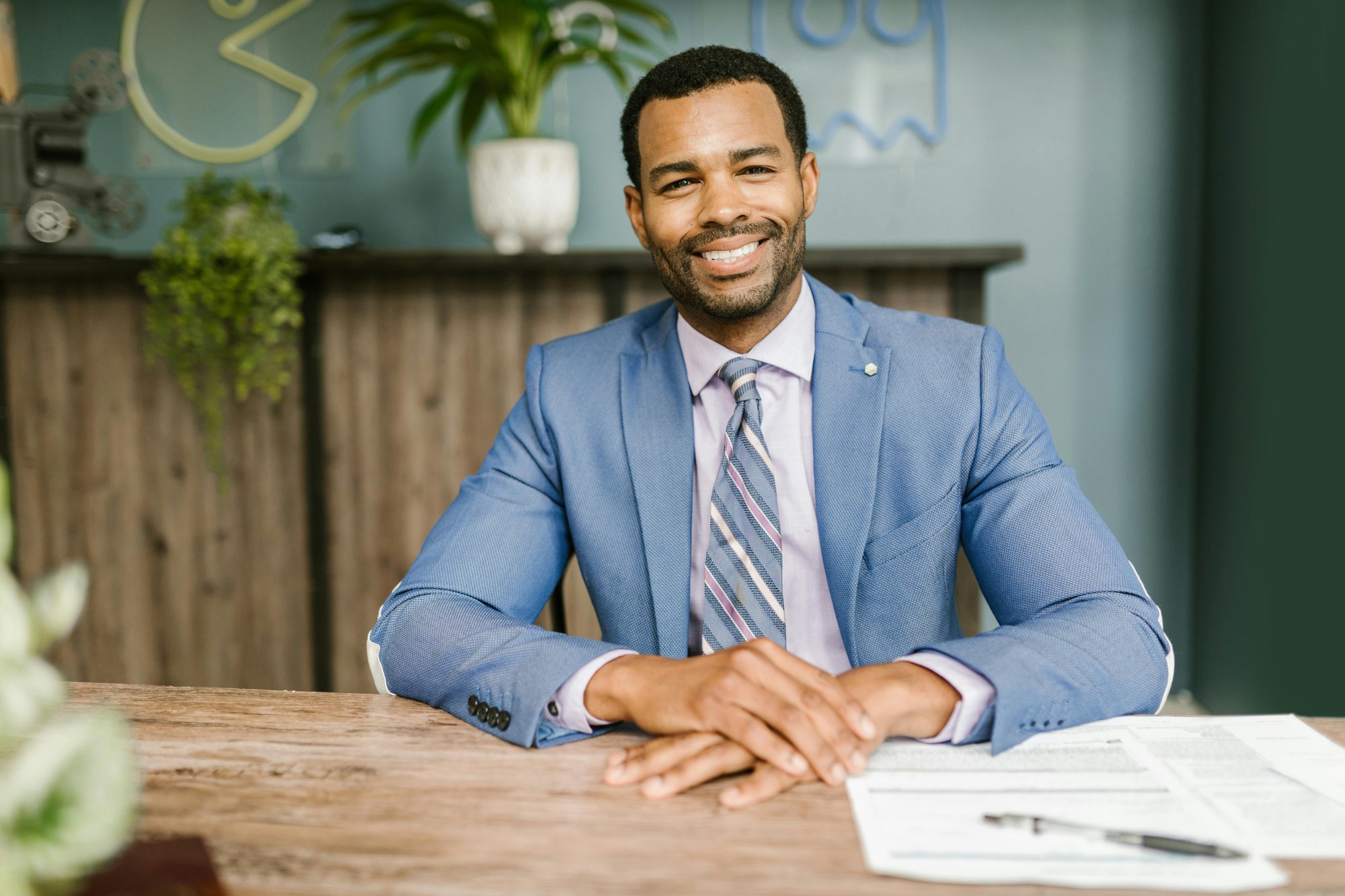 stock - smiling guy at desk